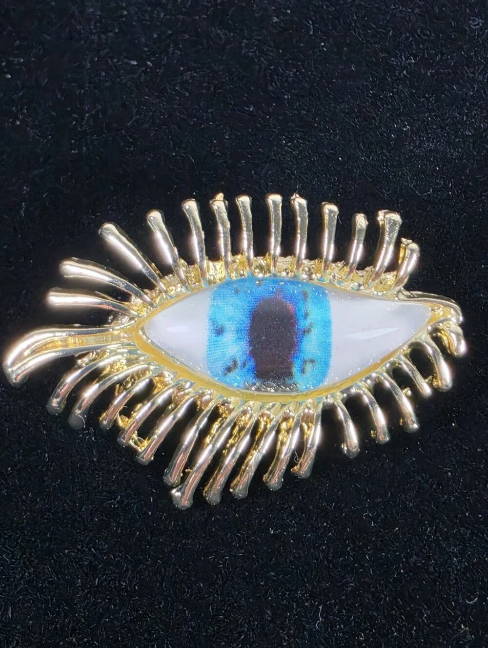 Gold Eyelash Eye Brooch with Blue Enamel Accent